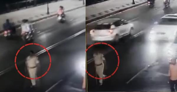 监控录像:二手车经销商驾驶的宝马超速撞向警务督察