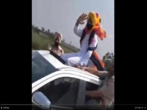 旁遮普省交通部长坐在汽车的天窗上旅行，视频激起了争议